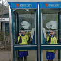 Twins Ben and Lee Lyons, Patrickswell, pose in the county's last payphones