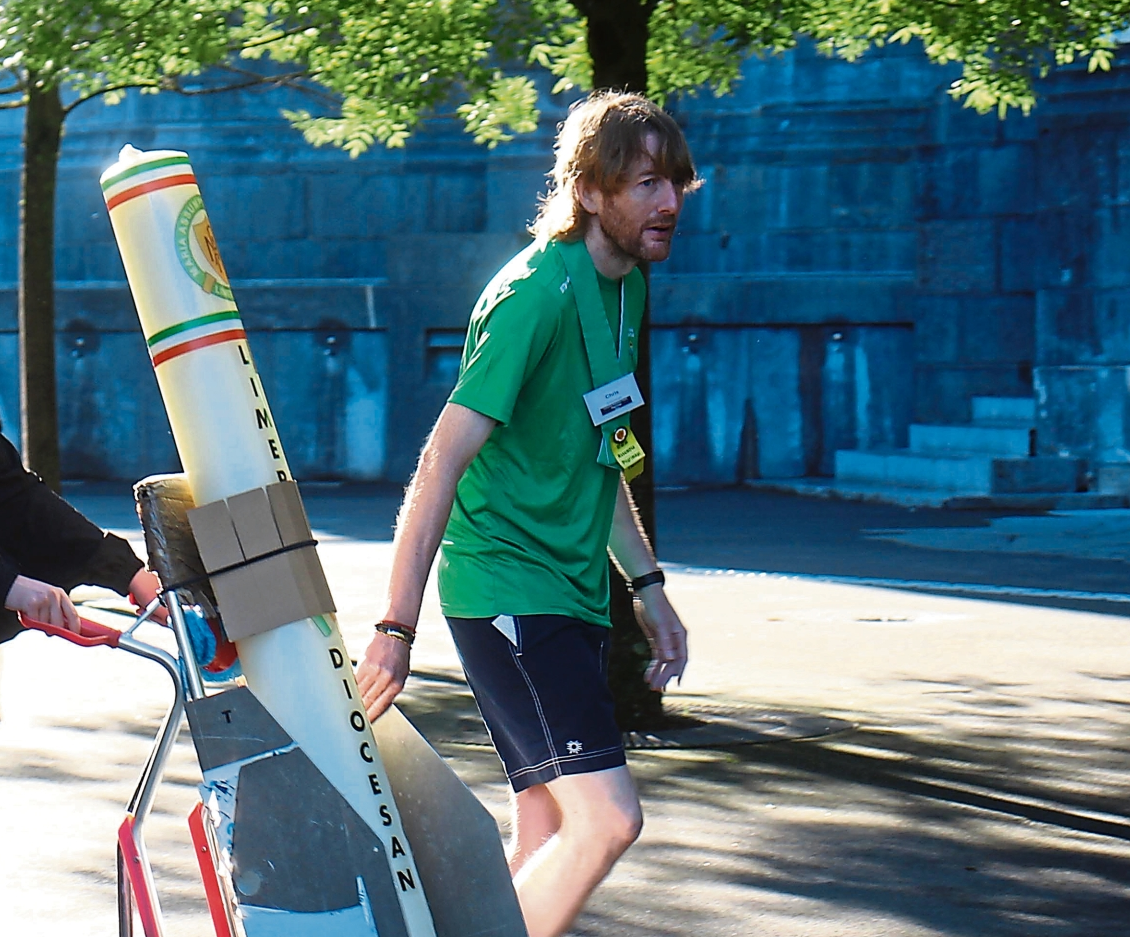 Popular Limerick priest Fr Chris O’Donnell leads one of the processions in Lourdes I PICTURE: Michael Cowhey