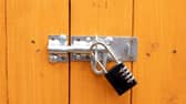 File Photo of padlock on garden shed