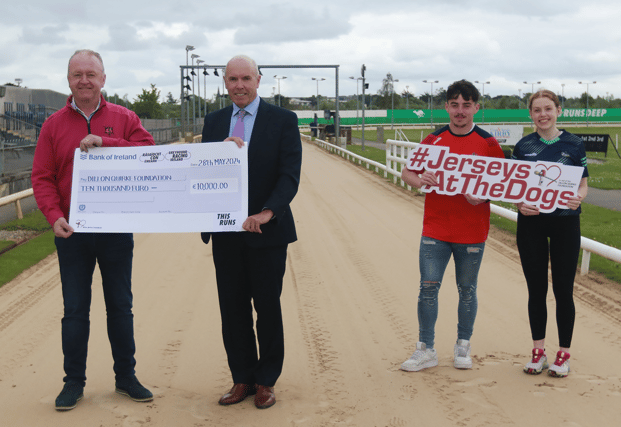 Tim Lucey, CEO Greyhound Racing Ireland, presents Dan Quirke, Founder Dillon Quirke Foundation with a cheque of €10,000 raised at the Jerseys At The Dogs Nationwide Bucket Collection