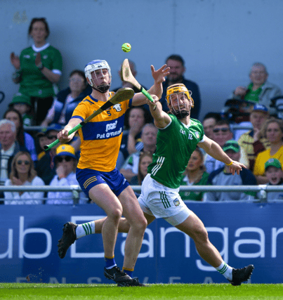Tom Morrissey of Limerick is tackled by Diarmuid Ryan of Clare during the Munster SHC Round one match | PICTURE: Sportsfile