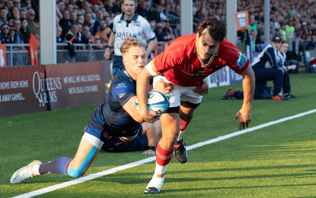 Antoine Frisch, of Munster, evades the tackle of Duhan van der Merwe to score one of his two tries in their bonus point URC win over Edinburgh at Hive Stadium on Friday | PICTURE: Sportsfile