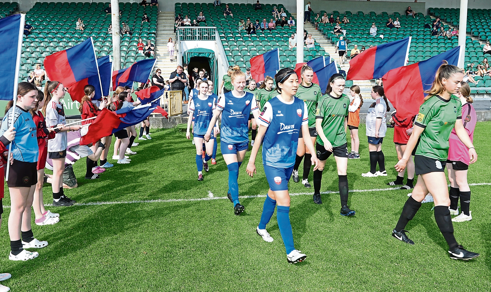 Players from Treaty United and Peamount United enter the pitch for Saturday's Women's Premier Division fixture at the Markets Field | PICTURE: Brendan Gleeson
