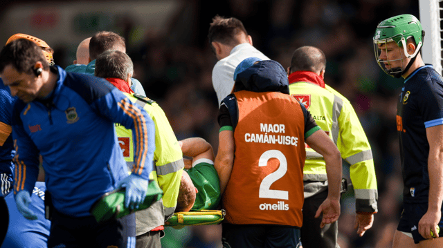 Peter Casey is stretchered from the field after breaking his ankle while scoring Limerick's second goal against Tipperary on Sunday I PICTURE: SPORTSFILE