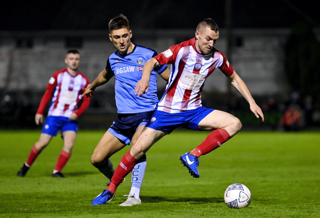 Mark Walsh, of Treaty United, in action against Dylan Duffy, of UCD, during the Extra.ie FAI Cup quarter-final