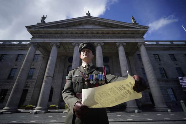 Army personnel and the brass and pipe bands lined up outside the capital’s iconic GPO building on O’Connell Street for the ceremony, which involved an army flyover and the president laying a wreath for those who had died.
