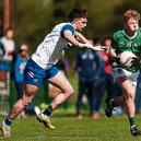 Limerick's Diarmuid Hynes is tackled by Calum Sloan, of Waterford, during the EirGrid Munster U-20 Football Championship fixture at Ballyagran on Saturday last | PICTURE: Tom Beary