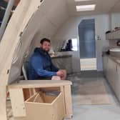 Rory pictured during the assembly of the interior set for the private jet that features in Lift