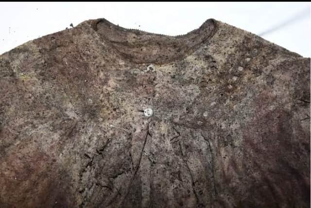 An item of clothing and a shoe were recovered at the scene. An image of both items have now been released in a bid to solve the mystery. 