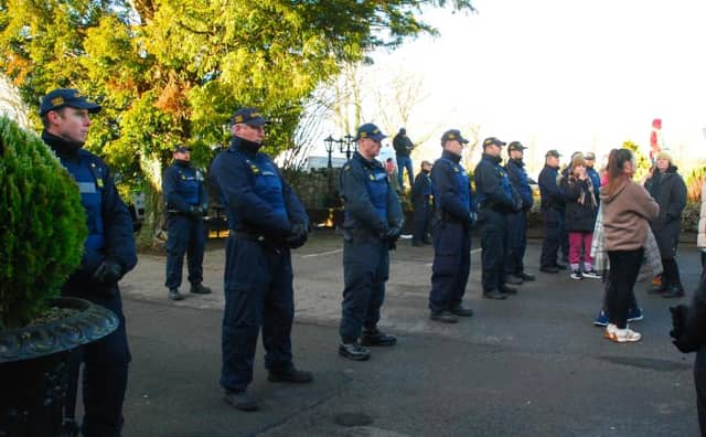 Members of the Garda Public Order Unit line the entrance to Racket Hall Hotel in Roscrea | PICTURE: PJ Wright