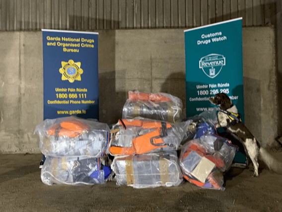 Detector dog Harley with the cocaine seized on a ship in Foynes Port
