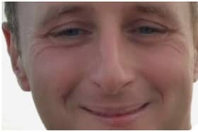 John is described as being 5’ 10” in height, of medium build with short brown hair.