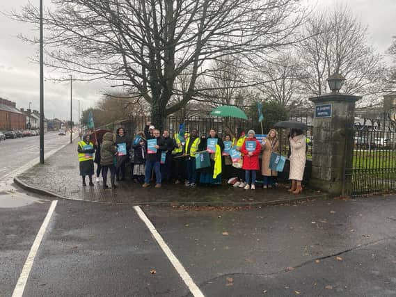 Staff pictured outside St Joseph's Hospital at Mulgrave Street in the city centre this Wednesday lunchtime