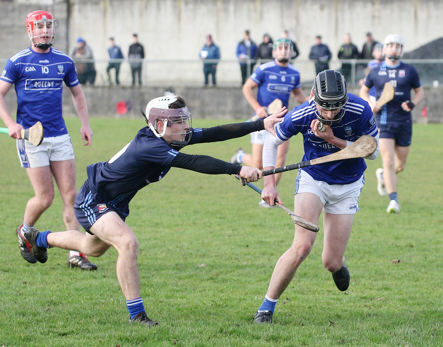 Castletroy College's Cathal O'Mara closes in on Paddy Nagle, of St Flannan's College, in Wednesday's Dr Harty Cup preliminary quarter-final at Meelick | PICTURE: Brendan Gleeson