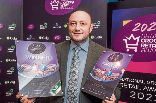 Padraig Broderick, the proprietor of the Spar store in Croom, celebrates his award after the ceremony in Dublin