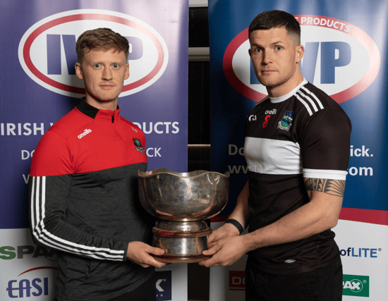 Adare's Shane Doherty and Newcastle West's Iain Corbett with the Fr Casey Cup ahead of today's SFC final. PICTURE: SkyView Photography