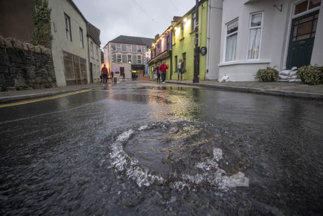 Parts of Co Wexford were submerged, while the main motorway and train line linking Belfast and Dublin were both affected by flooding.