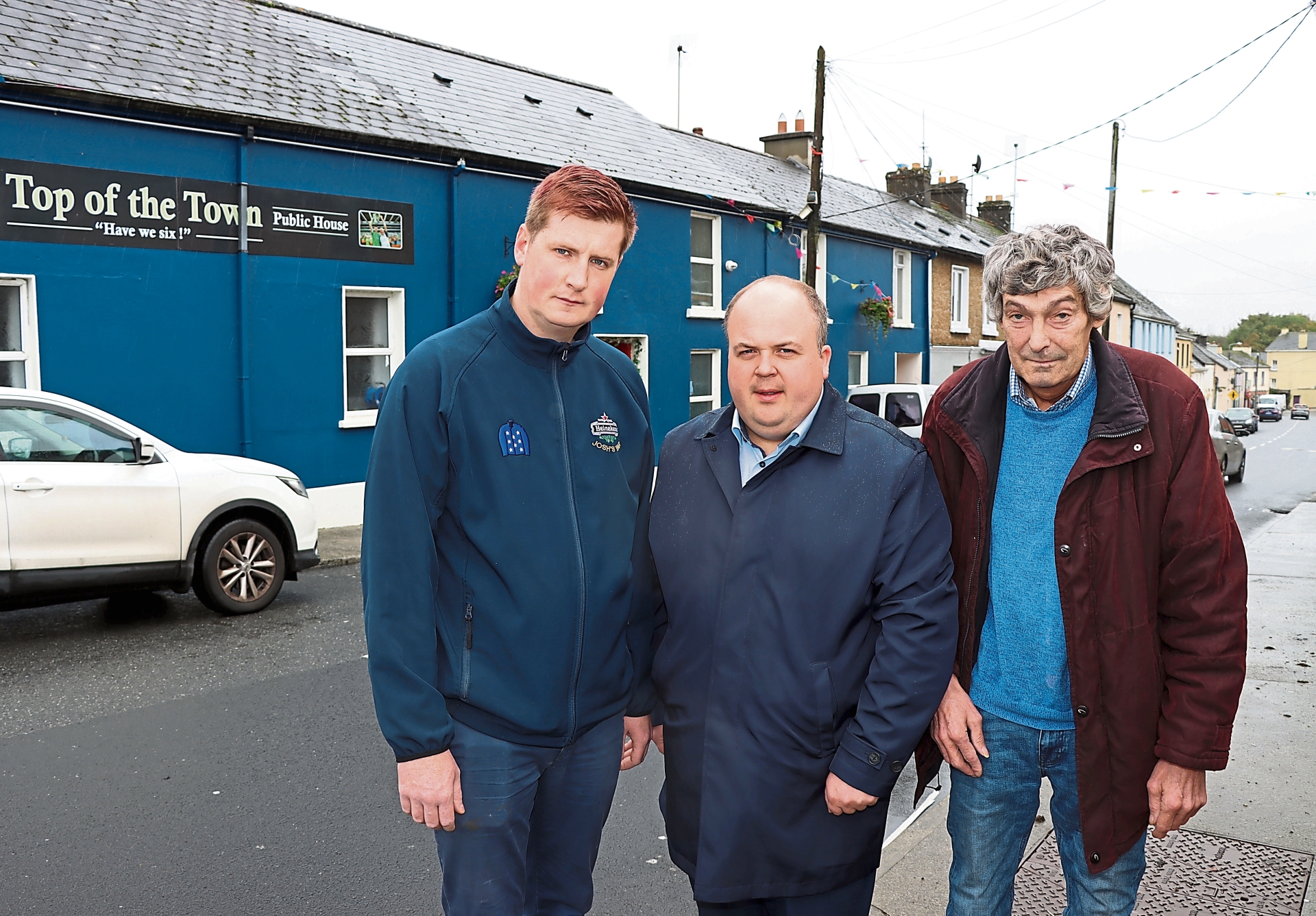 Josh Sheahan, who owns Top of the Town bar in Askeaton, with Adare/Rathkeale district leader, Cllr Adam Teskey and Vincent Feheney, Askeaton PICTURE: Adrian Butler