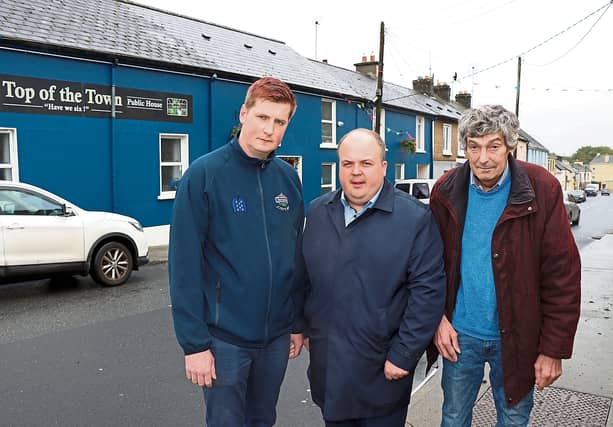 Josh Sheahan, who owns Top of the Town bar in Askeaton, with Adare/Rathkeale district leader, Cllr Adam Teskey and Vincent Feheney, Askeaton PICTURE: Adrian Butler