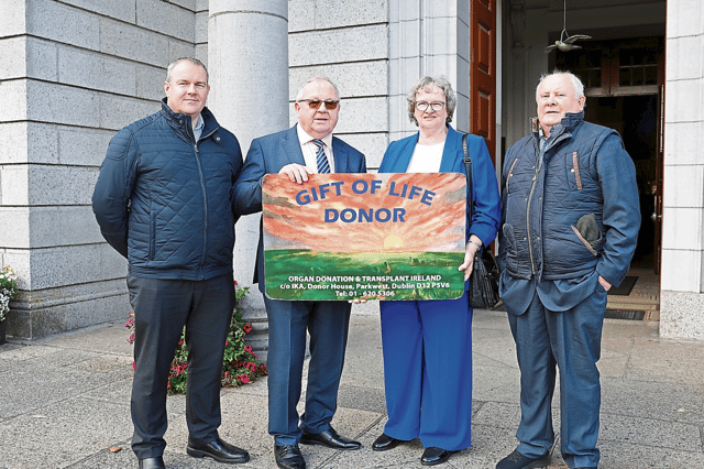 Ciaran, Gerard and Margaret Reidy, an organ donor family from Loughill West, Limerick with Fr Michael O'Connor
