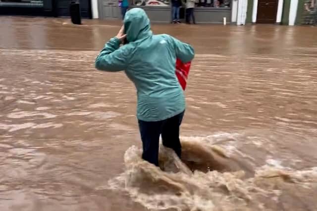 Members of the Irish Defence Forces were deployed in the town of Midleton, Co Cork, where more than 100 properties were flooded.
