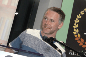 Fiction writer Edward O'Dwyer speaking at the launch of his latest book at The Strand Hotel