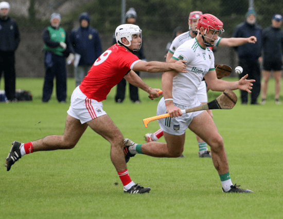 Ballybrown's Colin Coughlan in action against Mungret's Rory Duff during their meeting last week. PICTURE: Brendan Gleeson
