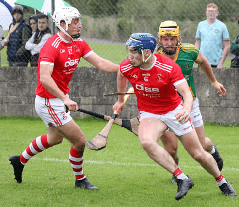 Doon's Eddie Stokes is chased down by Ahane's Tom Morrissey with Pat Ryan in close attendance during their Limerick SHC clash in Cappamore. PICTURE: Brendan Gleeson