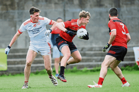 Adare's Shane Doherty in action against Monaleen's Paul O'Shea in the first round of the Limerick SFC. PICTURE: Keith Wiseman