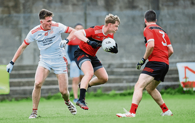 Adare's Shane Doherty in action against Monaleen's Paul O'Shea in the first round of the Limerick SFC. PICTURE: Keith Wiseman