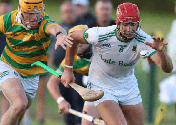 Ballybrown's Colin Coughlan is chased down by David Garry of South Liberties. PICTURE: Keith Wiseman