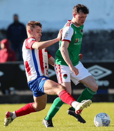 Treaty United's Dean George tackles Cork's Cian Murphy when the sides met at the Markets Field last season. PICTURE: Sportsfile
