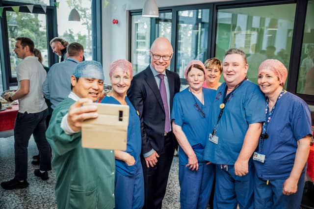 Some of the staff get a selfie as The Minister for Health, Mr Stephen Donnelly TD officially opened the new developments at Croom Orthopaedic Hospital | PICTURE: Brian Arthur