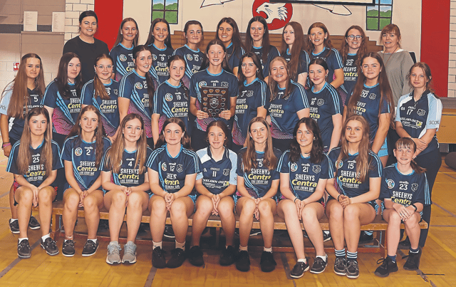 The Scoil Pól County Camogie Championship winning squad with coaches Ms Sarah Collins and Ms Noreen Bluett. PICTURE: Ita West