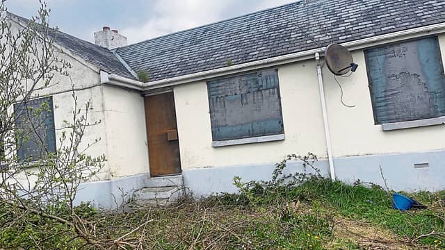 The boarded up house in Bruree