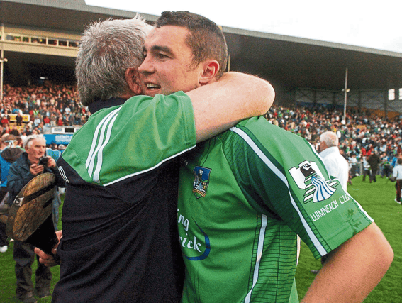 Stephen Lucey embraces Limerick manager Richie Bennis after the first game in their trilogy with Tipperary in the 2007 Munster SHC