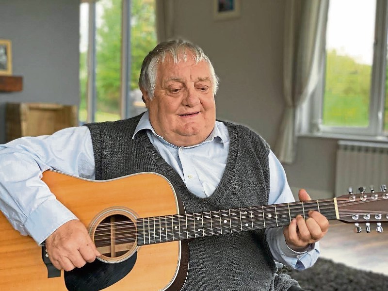 The late John ‘Johnny’ McDermott, who passed away in March from a long-term illness, playing his guitar