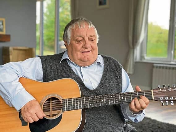 The late John ‘Johnny’ McDermott, who passed away in March from a long-term illness, playing his guitar