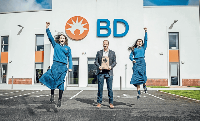 Reach for the stars! Desmond College students Emma Greaney and Madison Saracoglu pictured with Seán Wall after winning the first place prize