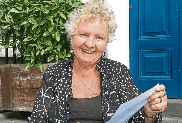 The late ‘Polly the Poet’ Fitzpatrick, photographed with one of her pieces | PICTURE: ADRIAN BUTLER