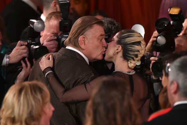Far away from the streets of Gotham City, the pop star, 36, and Gleeson, 67, were pictured embracing on the champagne-coloured carpet.