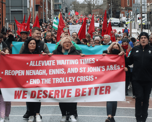Protesters marching down Henry Street in Limerick city against the conditions at UHL on January 21, 2023