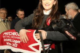 Emma Buckley with her winning dog Bobsleigh Dream after his success in the Matchbook Betting Exchange St Leger 550 Final at Limerick | PICTURE: Brendan Gleeson