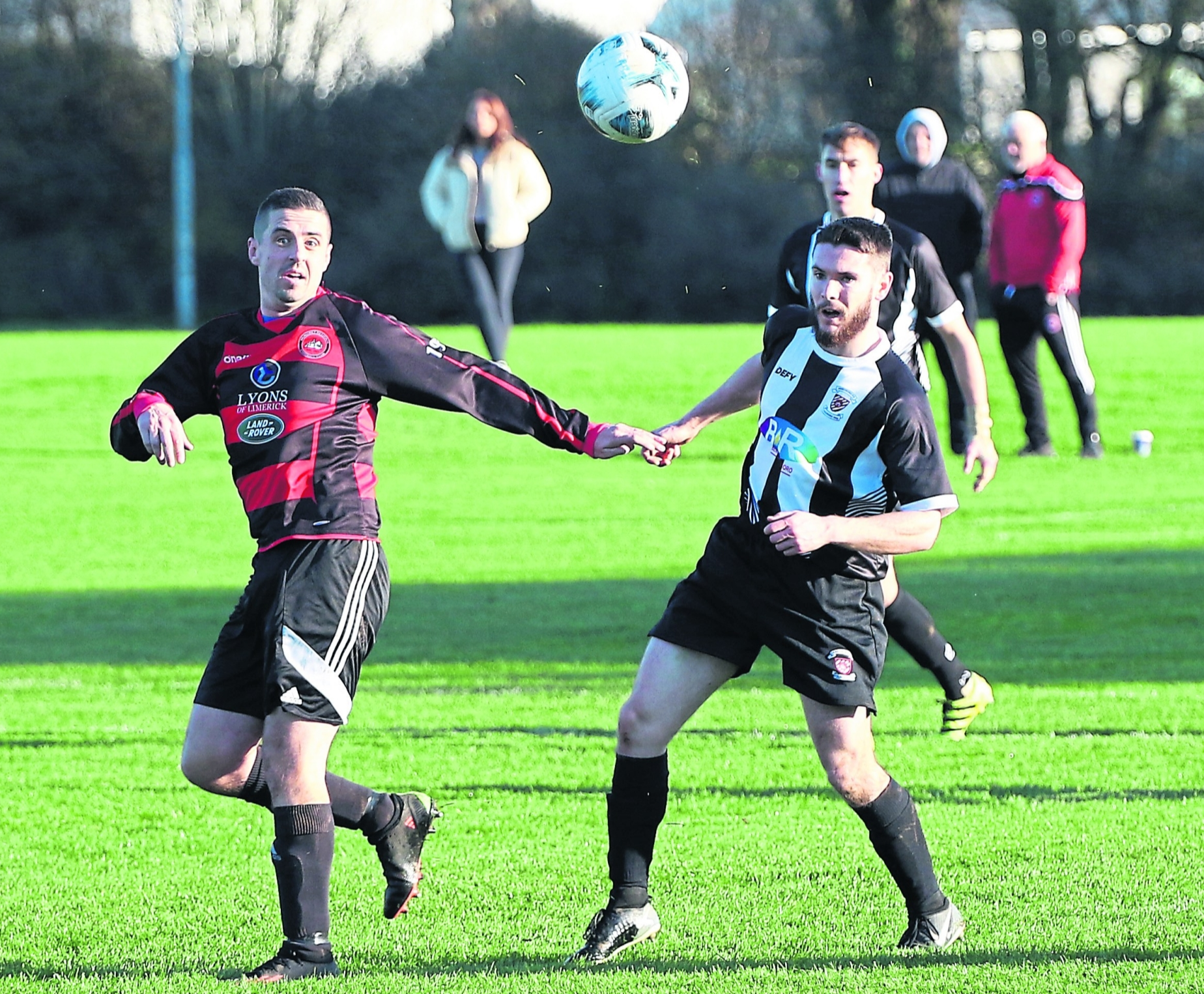 Aled Harkin, of Mungret Regional, competes for possession in the Premier Division game with Janesboro at Mungret on Sunday | PICTURE: Brendan Gleeson
