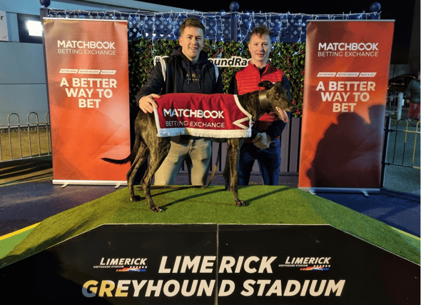 Wi Can Dream, winner of the first quarter final of the Matchbook Irish St. Leger at Limerick Greyhound Stadium pictured with Tom O’Keefe and sponsor rep, Enda Kendrick