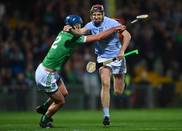 David Dempsey breaks past Mark O'Loughlin in Na Piarsaigh's Limerick SHC final win over Kilmallock | PICTURE: Sportsfile