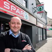 Padraig Broderick outside his store in Croom