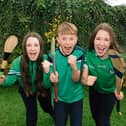 Pupils from Scoil Mocheallog cheering on Kilmallock ahead of the county hurling final against Na Piarsaigh | PICTURES: Adrian Butler