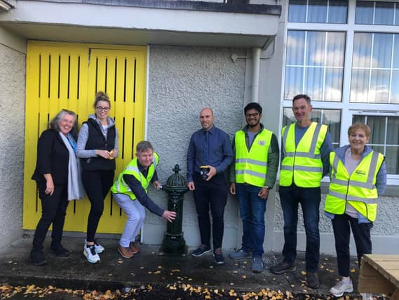 Sinead McDonnell, LCCC; Grainne Greene, vice principal; John Hardiman, Richie Ryan, principal; Rohan Jangam, Eamonn Carney & Anne Hayes (All Castleconnell Tidy Towns) at the installing of the fountain