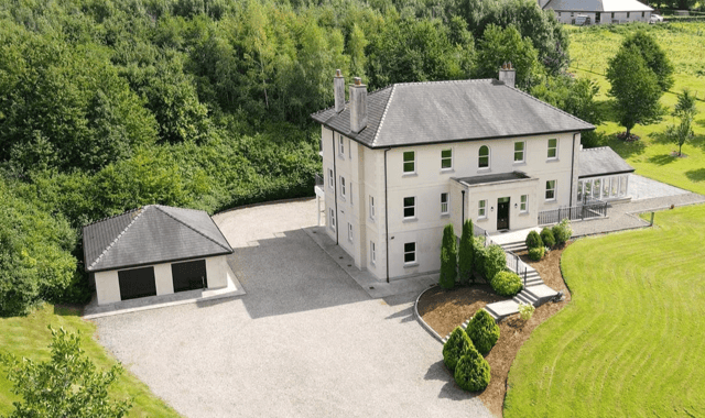 This substantial property features seven bedrooms (five with ensuite facilities) playroom, office and laundry room and detached garage